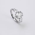 Oval Brilliant & Pear Three-Stone Diamond Ring