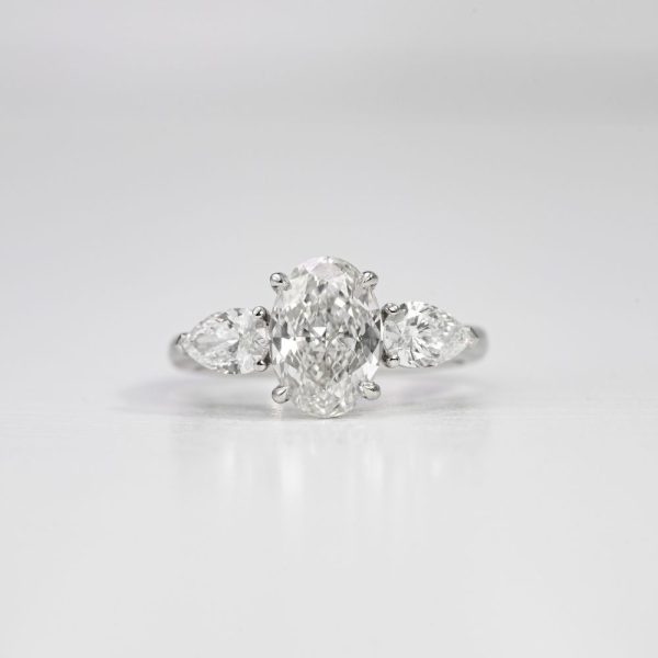 Oval Brilliant & Pear Three-Stone Diamond Ring (2)