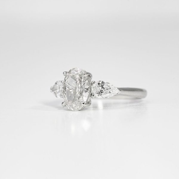 Oval Brilliant & Pear Three-Stone Diamond Ring (3)