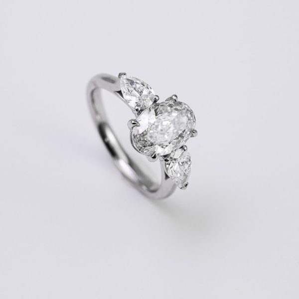 Oval Brilliant & Pear Three-Stone Diamond Ring