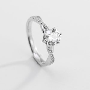Round Brilliant Twisted Pavé Diamond Solitaire Ring